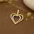 Złota zawieszka dwa serca